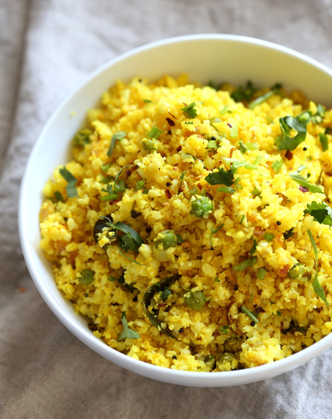 Lemony Turmeric Cauliflower Rice. Easy Side with any meal. 1 Pot Lemon Cauliflower Rice with mustard seeds and garlic. #Vegan #Glutenfree #Grainfree #Nutfree #Recipe #Turmeric #cauliflowerrice #veganrucha