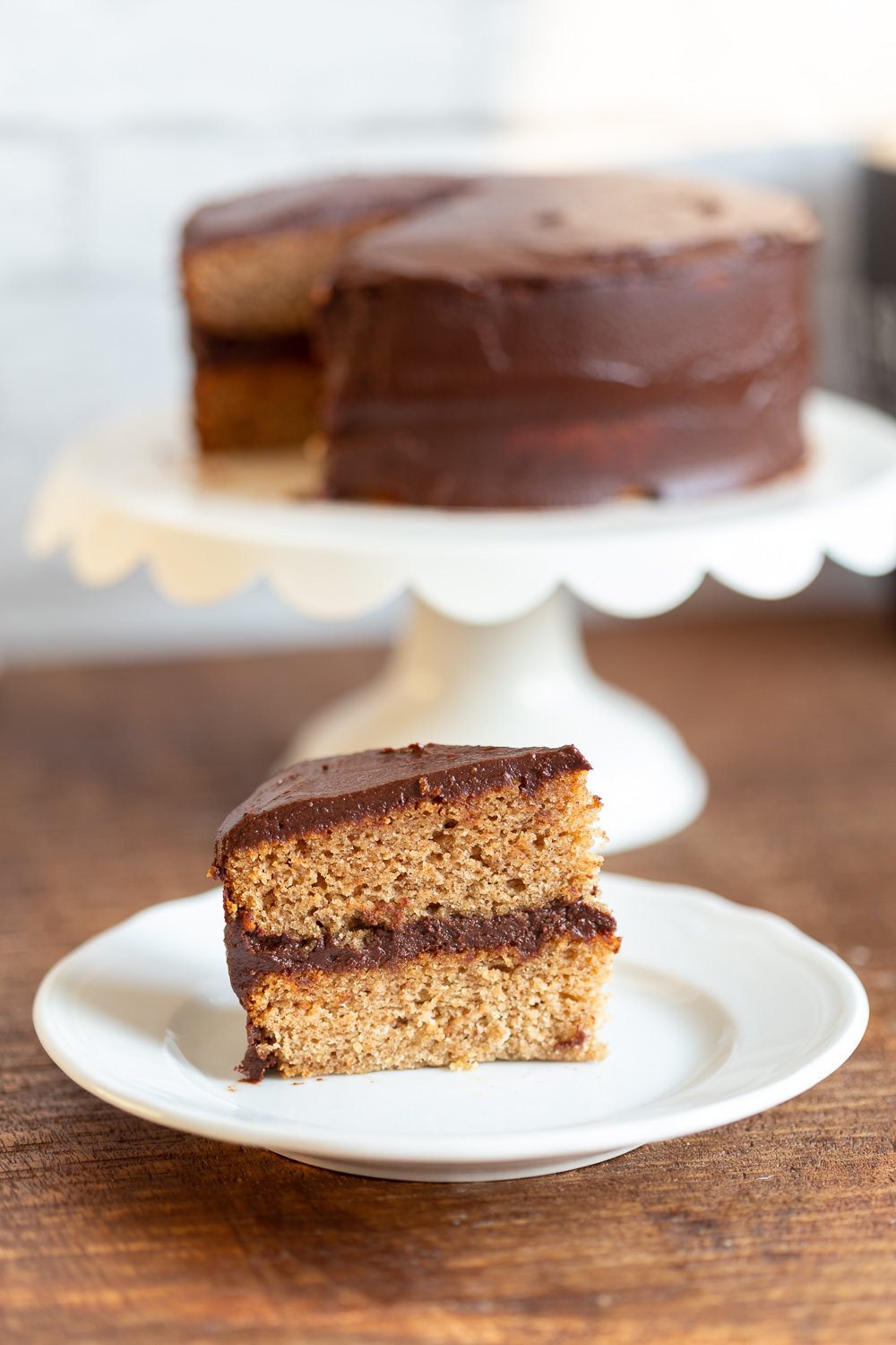 The Best Vegan Gluten free Vanilla Cake with Chocolate Frosting. Soft and delicious Vanilla cakes sweetened with dates. #Vegan #Glutenfree #vanillacake #gumfree #eggless #Recipe #veganRicha Can be #refinedsugarfree.