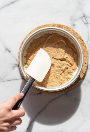 Our Vegan Gluten free Vanilla Cake batter in a cake pan