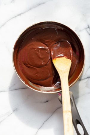 Chocolate frosting in a skillet for Our Vegan Gluten free Vanilla Cake
