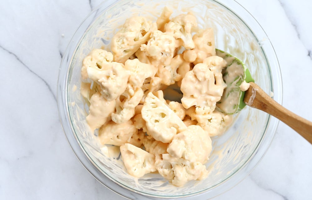 Cauliflower tossed in batter for our Vegan Nashville Hot Cauliflower Wings