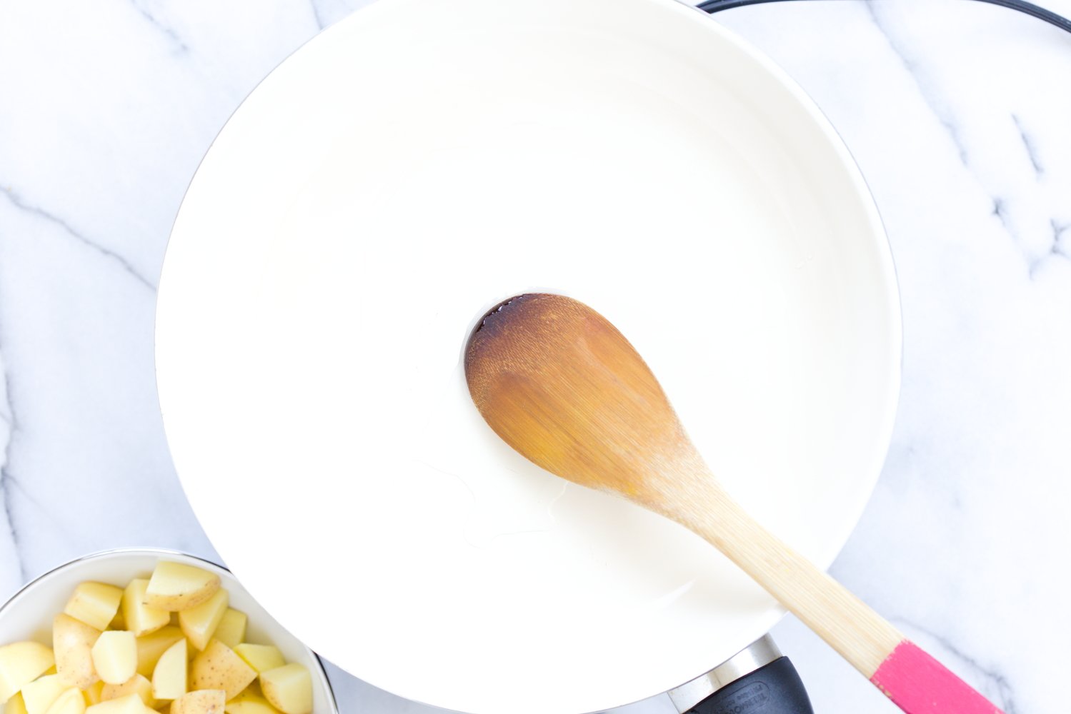 oil being heated in a skillet