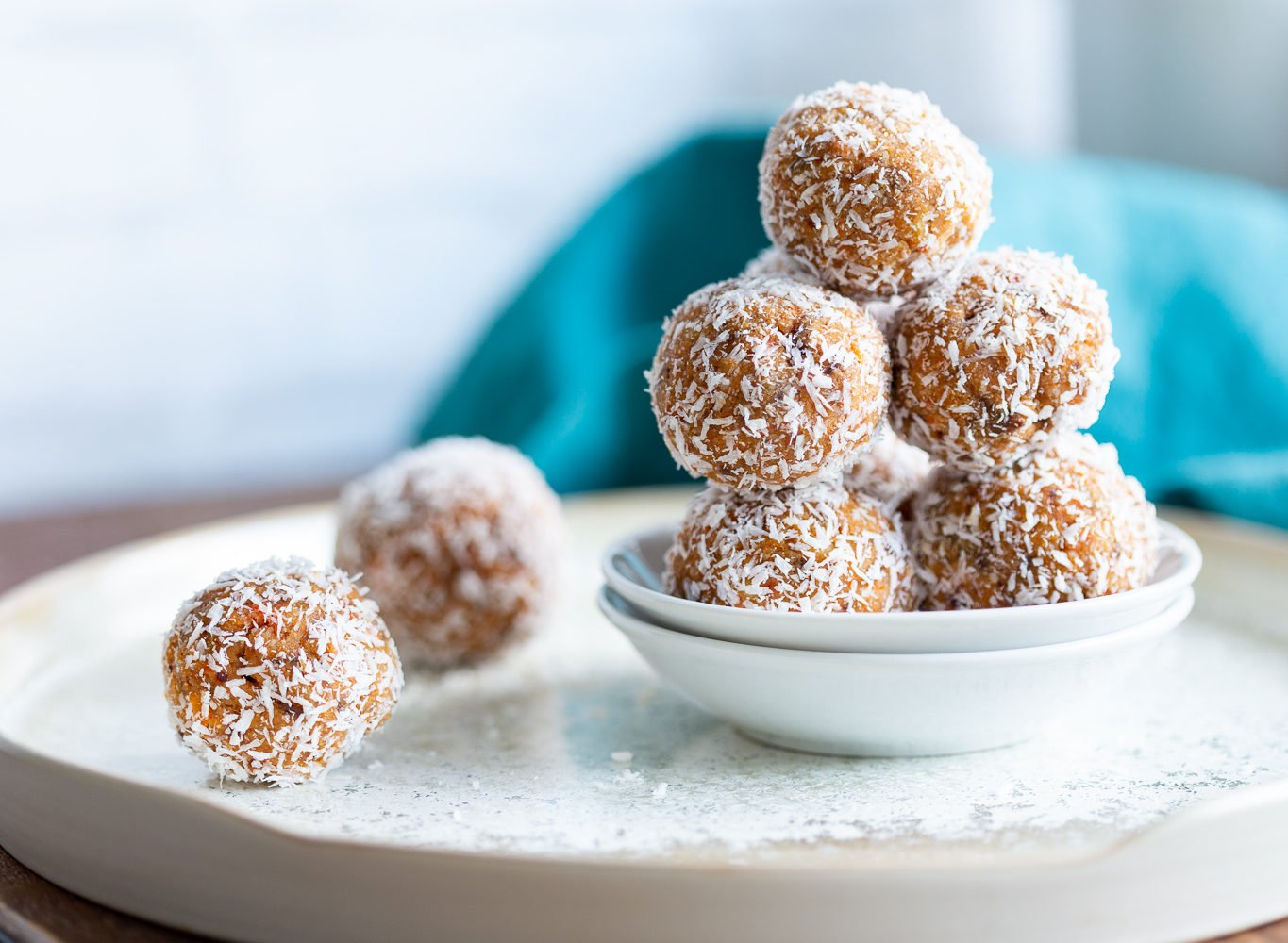 Easy Vegan Carrot Cake Bites Recipe! These Spiced Nut and Carrot Cake Balls Need just 8 ingredients and 15 minutes. Grainfree Carrot Cake Bliss Balls. Roll in coconut or dress with vegan cream cheese glaze. #CarrotCakeBites #Vegan #Glutenfree #Grainfree #Soyfree #healthy #VeganRicha VeganRicha.com