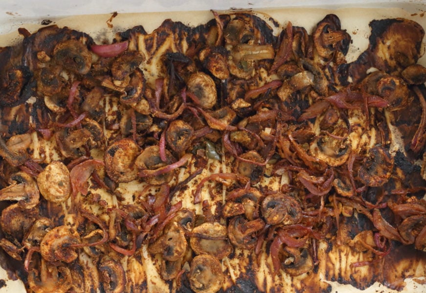 Vegan Carnitas. Mushrooms marinated in Spicy Smoky Zesty Marinade, Baked and served with toppings in tacos, wraps, burritos. Use jackfruit for variation. #vegan #Glutenfree #Nutfree #Recipe. Soyfree option #VeganRicha #mushroomcarnitas #veganarnitas