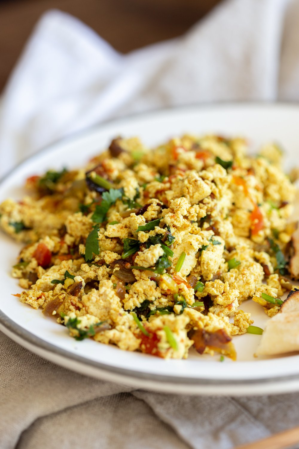 Our Vegan Tofu Bhurji in a white plate with border