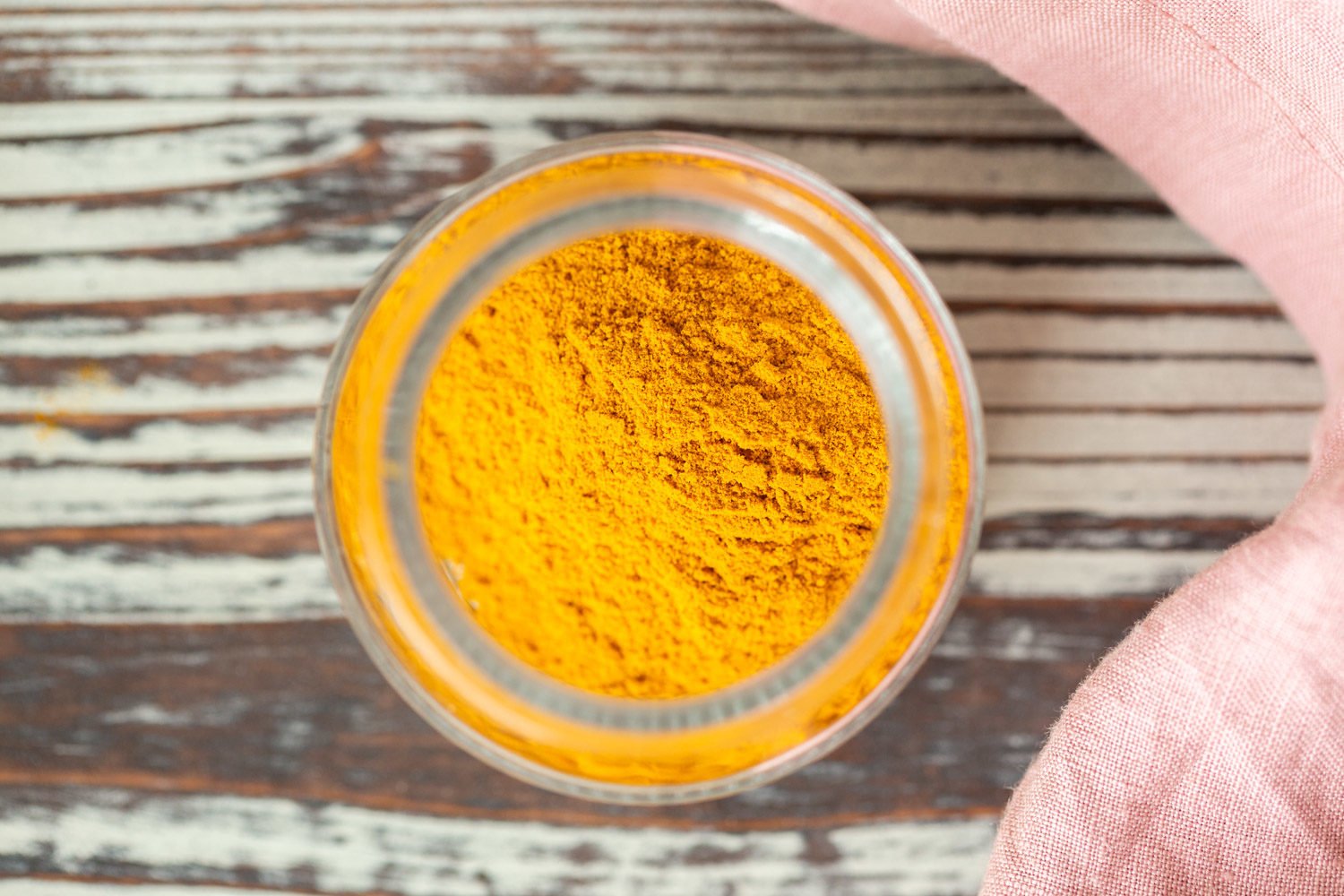 Turmeric for our Golden Chai Mix in a glass container
