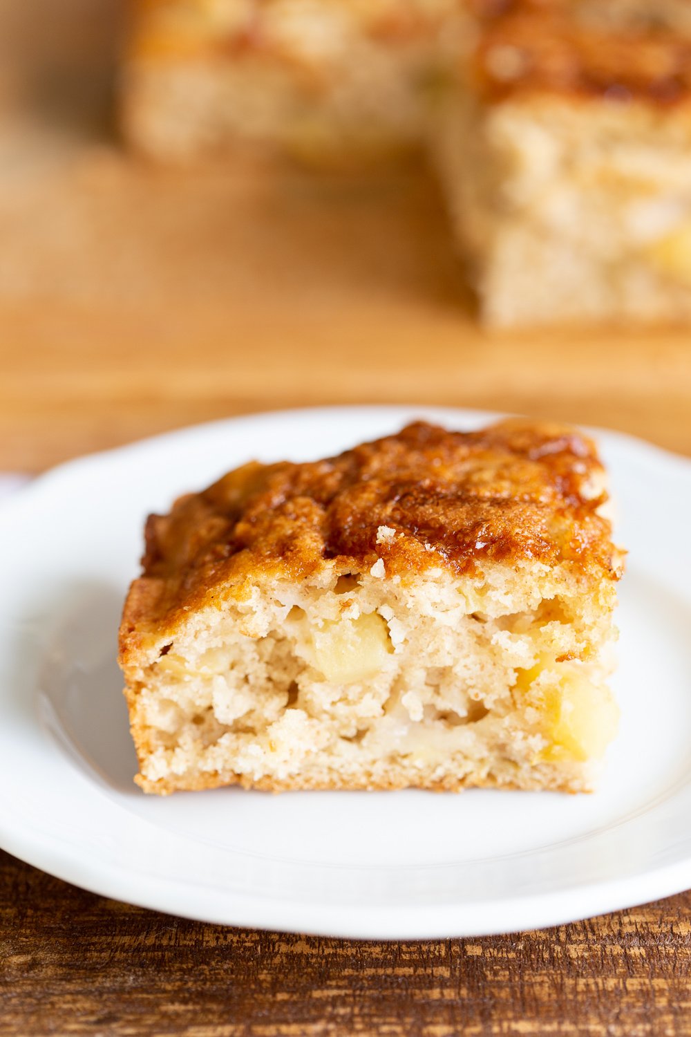 Vegan Apple Cake with Cinnamon Custard. Easy Apple Cake that is soft and light. Served with a creamy vegan vanilla custard.#VEgan #VeganRicha #VeganAppleCake #Soyfree #Recipe Nut-free Gluten-free Options