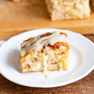 Vegan Apple Cake with Cinnamon Custard. Easy Apple Cake that is soft and light. Served with a creamy vegan vanilla custard.#VEgan #VeganRicha #VeganAppleCake #Soyfree #Recipe Nut-free Gluten-free Options