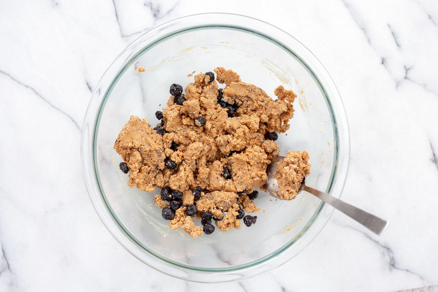 Dough for our Blueberry Muffin Energy Bites in a white bowl