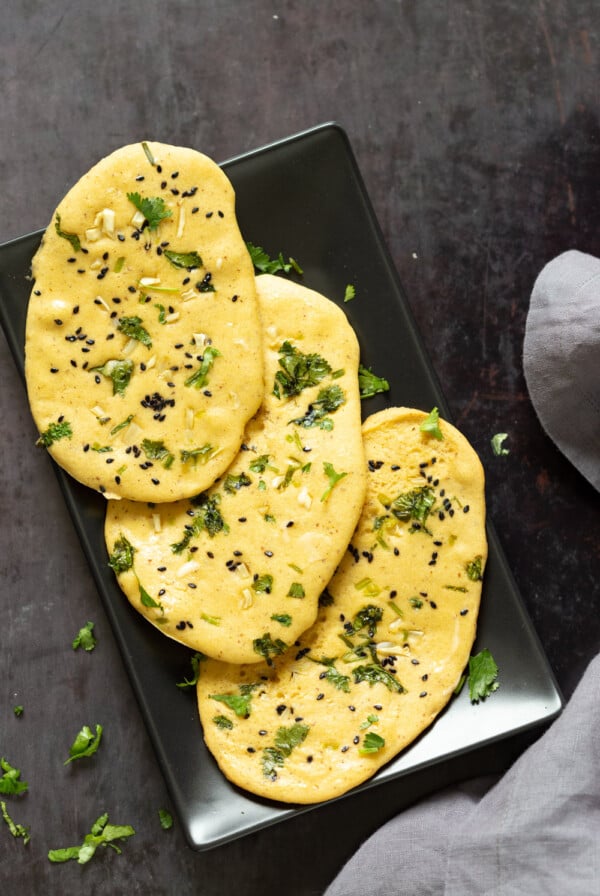 Vegan Gluten free Naan Flatbread. Grain-free Naan Recipe. 6 Main Ingredients,  1 Bowl, and 20 Minutes. Serve with curries or slice and serve with dips or add to bowls. Soyfree Nutfree options #Vegan #Glutenfree #grainfree #Veganricha #glutenfreenaan #grainfreenaan #chickpeaflournaan