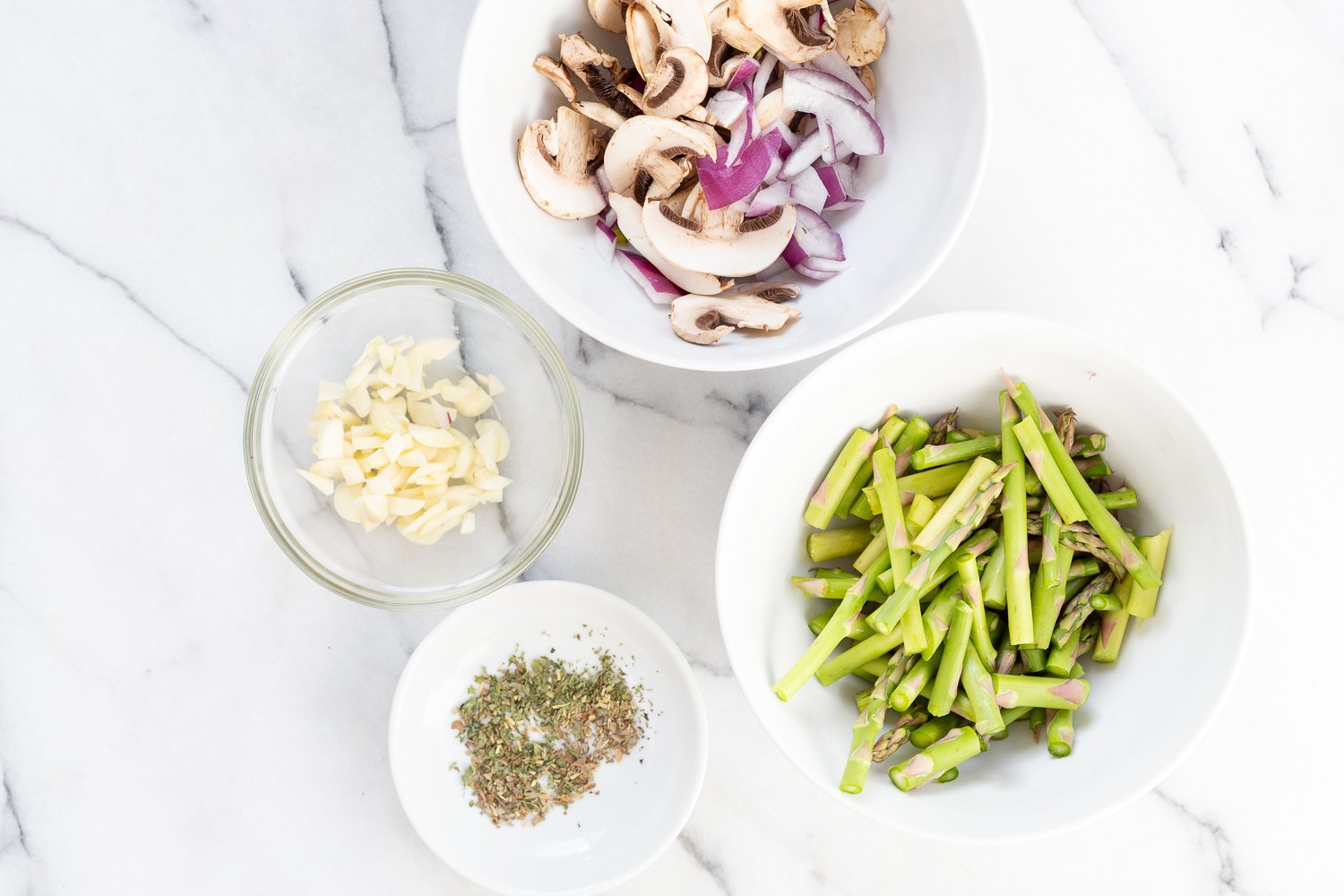 Ingredients in bowls for our Vegan Lemon Asparagus Pasta