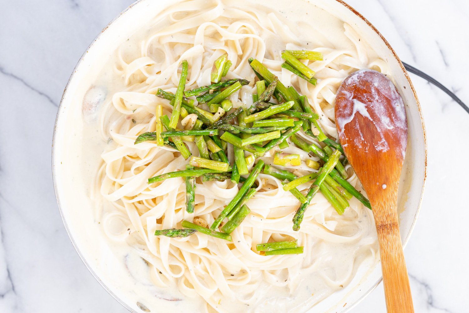 Vegan Lemon Asparagus Pasta - 30 mins! Creamy Lemon Alfredo style sauce with tofu with fettuccine and pan roasted garlic asparagus and more lemon. #Vegan #Nutfree #Recipe. Can be Glutenfree #VeganRicha #LemonAsparagusPasta 17 gm of protein
