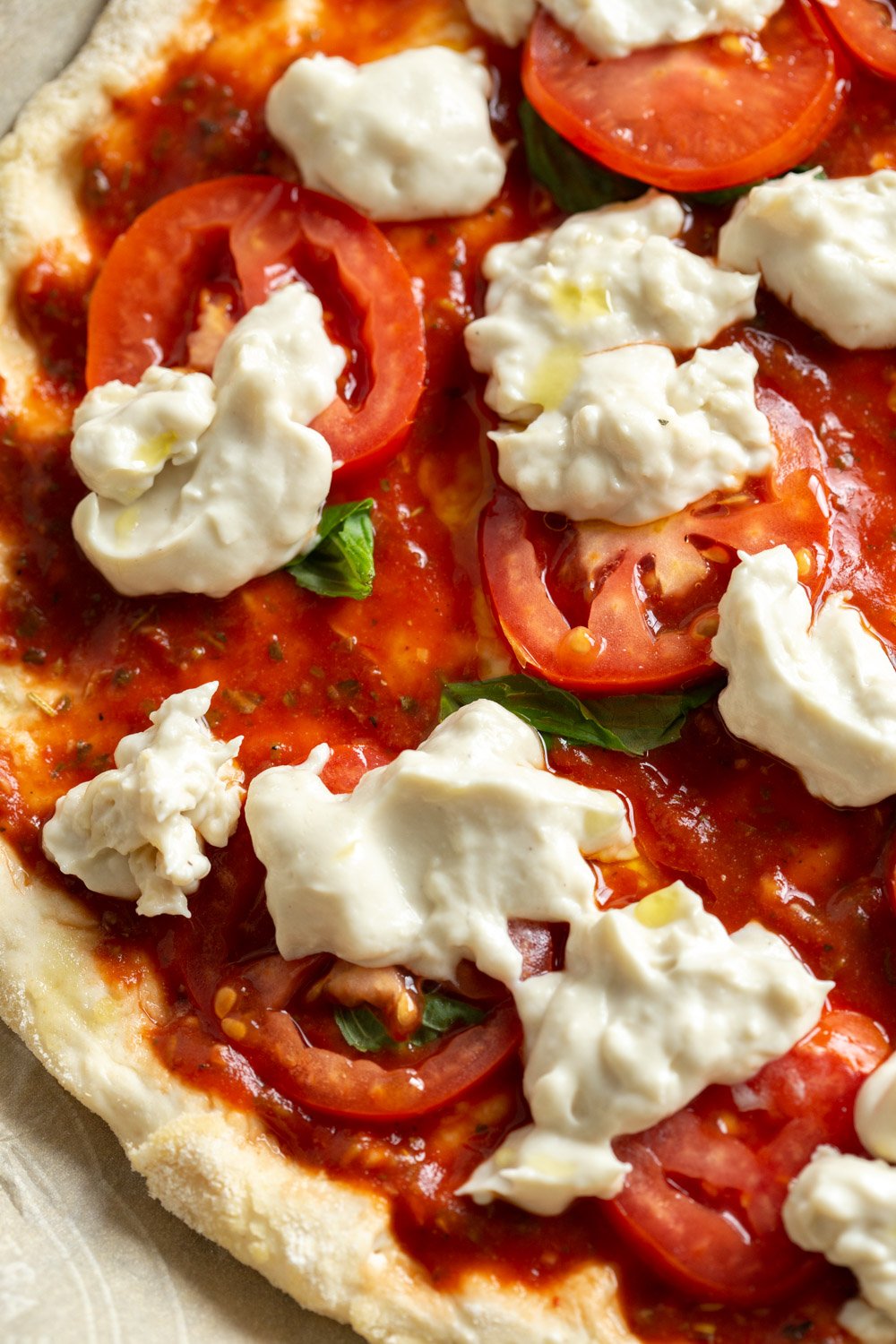 Our Vegan Margherita Pizza on parchment
