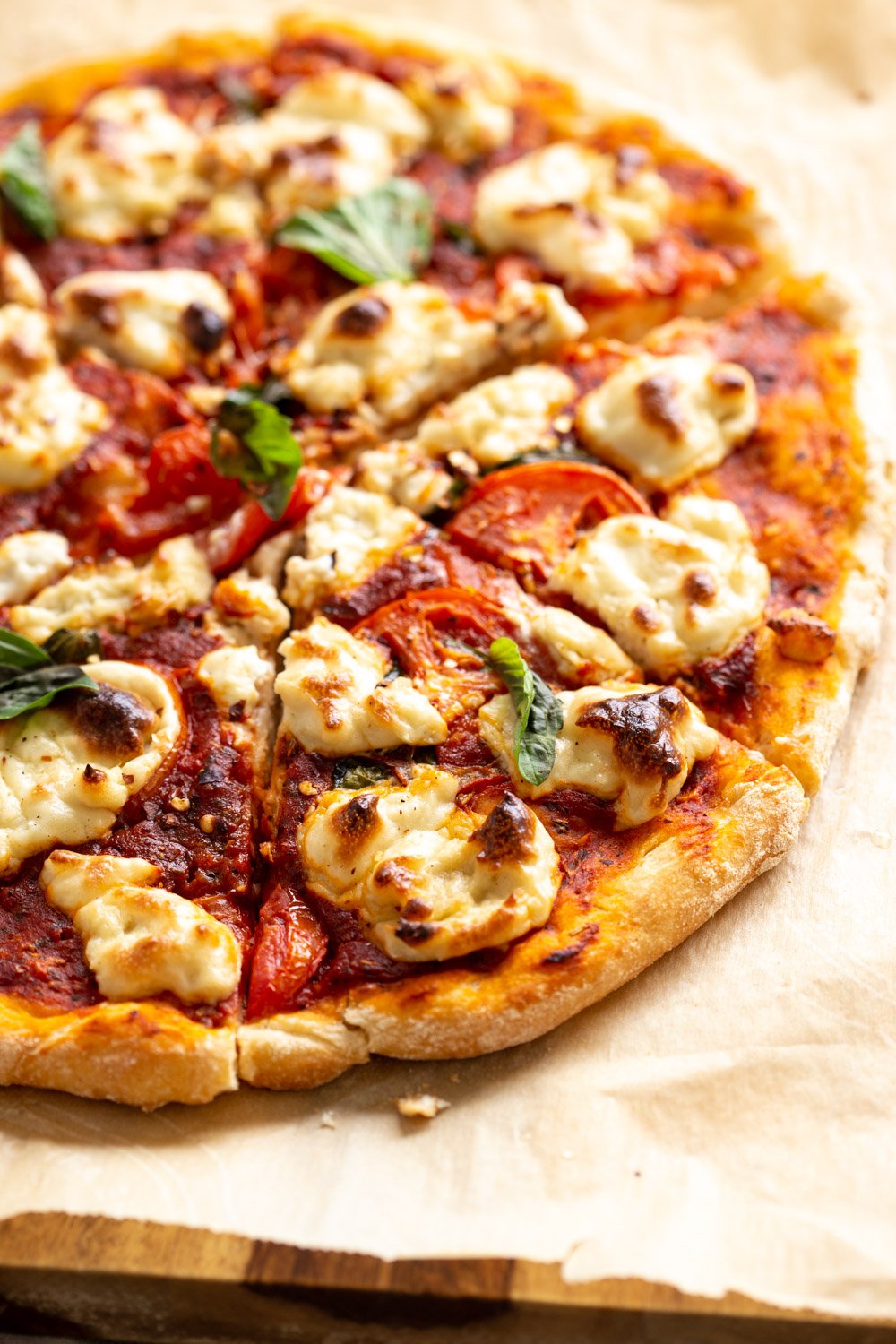 Our Vegan Margherita Pizza on parchment