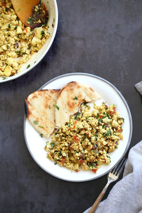 Tofu Bhurji - Vegan Bhurji or Akoori . Indian Scrambled eggs. Tofu scrambled with onion, tomato, cilantro and cumin for a delicious Eggless Bhurji Scramble Breakfast. #Vegan #Glutenfree #Nutfree #Recipe #VeganRicha #indianRecipe #tofuburji Can be soyfree. 