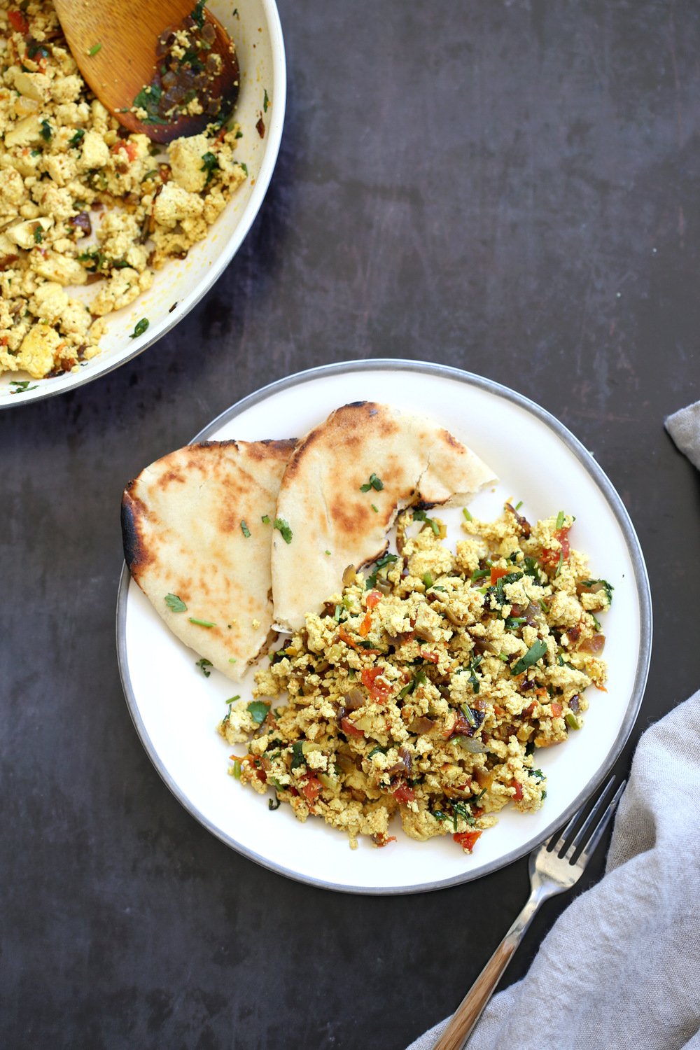 Tofu Bhurji - Vegan Bhurji or Akoori . Indian Scramble. Tofu scrambled with onion, tomato, cilantro and cumin for a delicious Eggless Bhurji Scramble Breakfast. 1 Pot 15 mins #Vegan #Glutenfree #Nutfree #Recipe #VeganRicha #indianRecipe #tofuburji Can be soyfree.