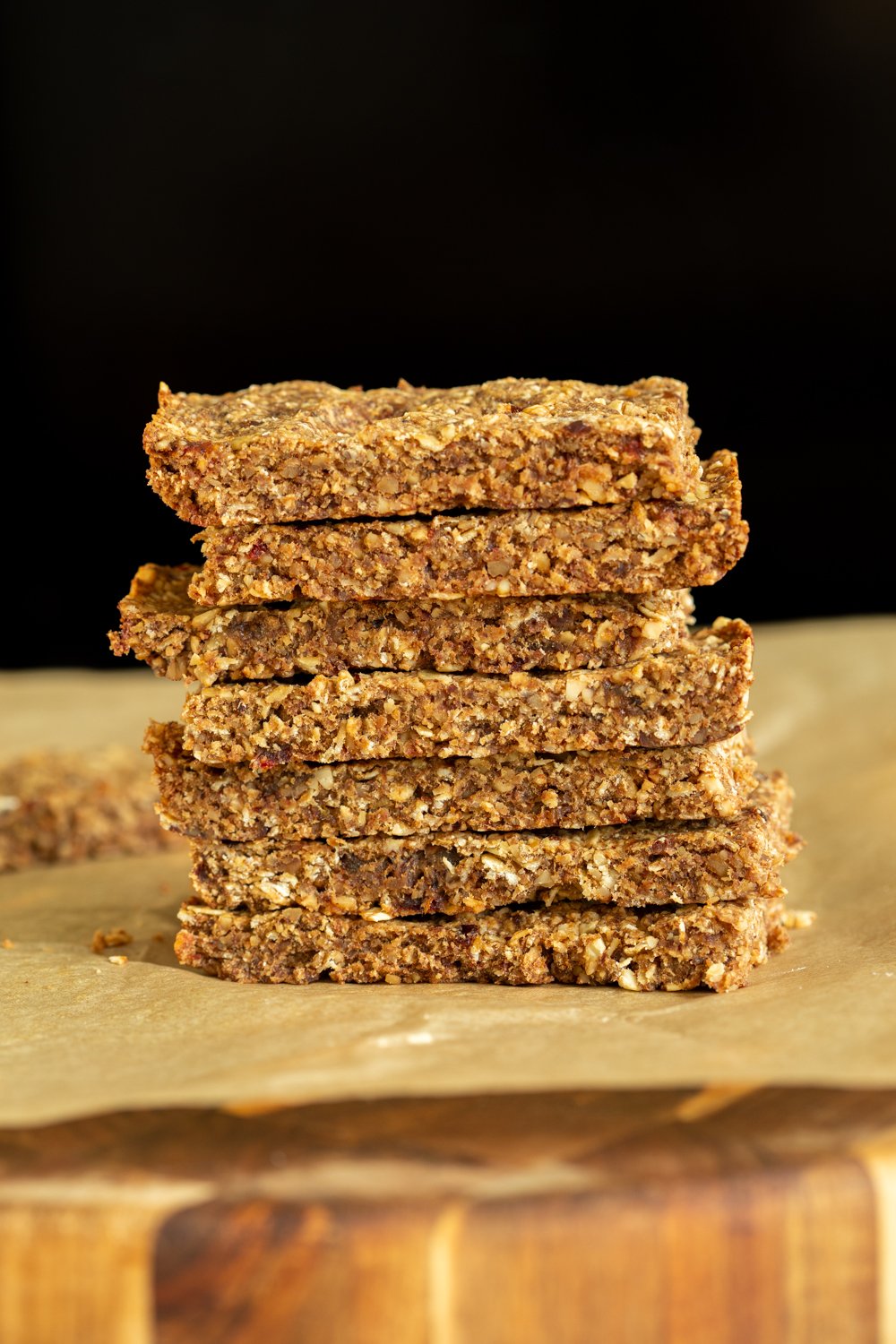 vegan granola bars  side view of a stack of vegan caramelized banana granola bars