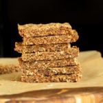 a stack of vegan banana nut granola bars with caramelized bananas