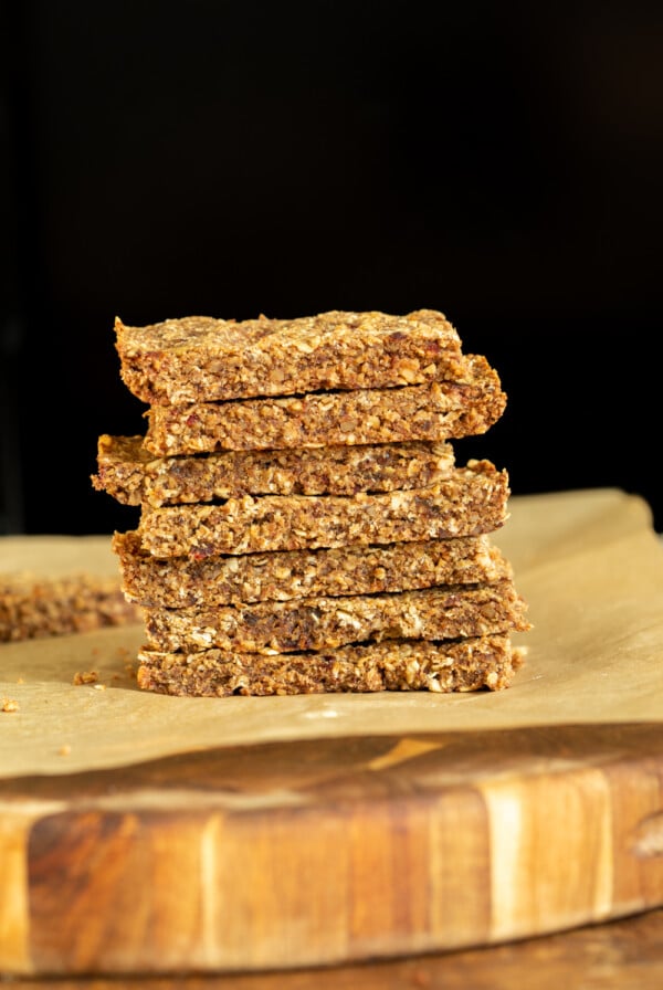 a stack of vegan banana nut granola bars with caramelized bananas
