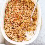 This Vegan Carrot Cake Baked Oatmeal has roasted carrots,, spices, nuts, dates and Oats! Crisp on the outside and spiced, delicious carrot cake like inside.  #Vegan #Soyfree #Recipe #VeganRicha #carrotcakeoatmeal #carrotcakebakedoatmeal Easily nutfree, #glutenfree