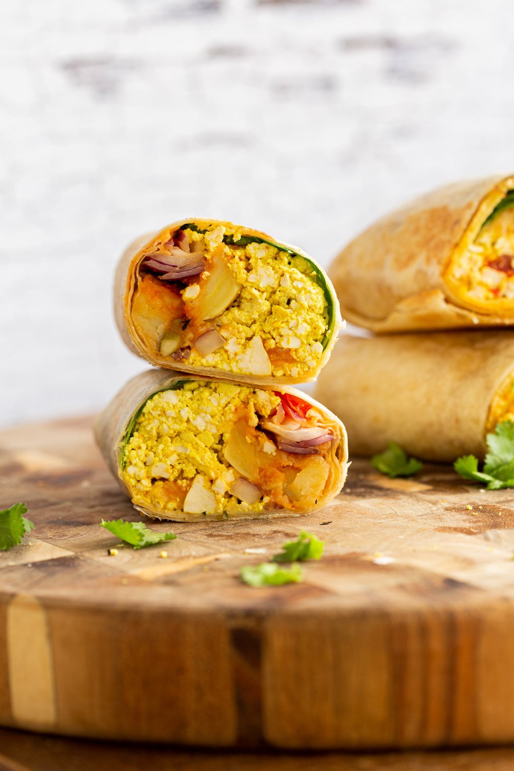 Vegan Breakfast burrito on wooden board