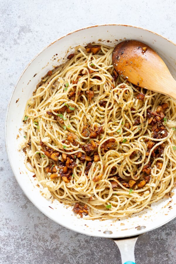 Our Vegan Cacio De Pepe with Smoky Chickpea Tofu Bits in a while skillet