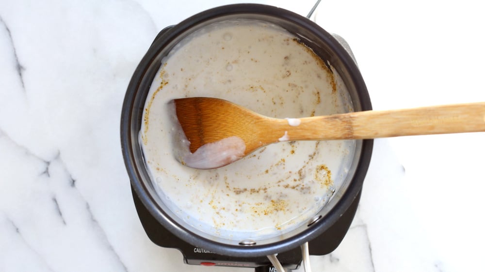 Coconut Curry Sauce in a saucepan for our Curried Tofu Banh Mi Sandwich