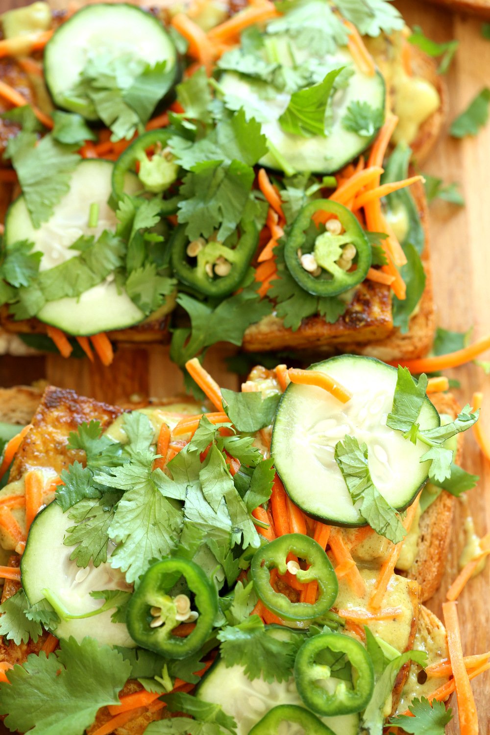 This Curried Tofu Banh Mi is Delicious, refreshing and comes together within 30 mins. Easy Vegan Banh Mi Sandwich with coconut curry sauce! #Vegan #VeganRicha #TofuBanhMi #VeganBanhMi #Nutfree #Recipe Can be glutenfree
