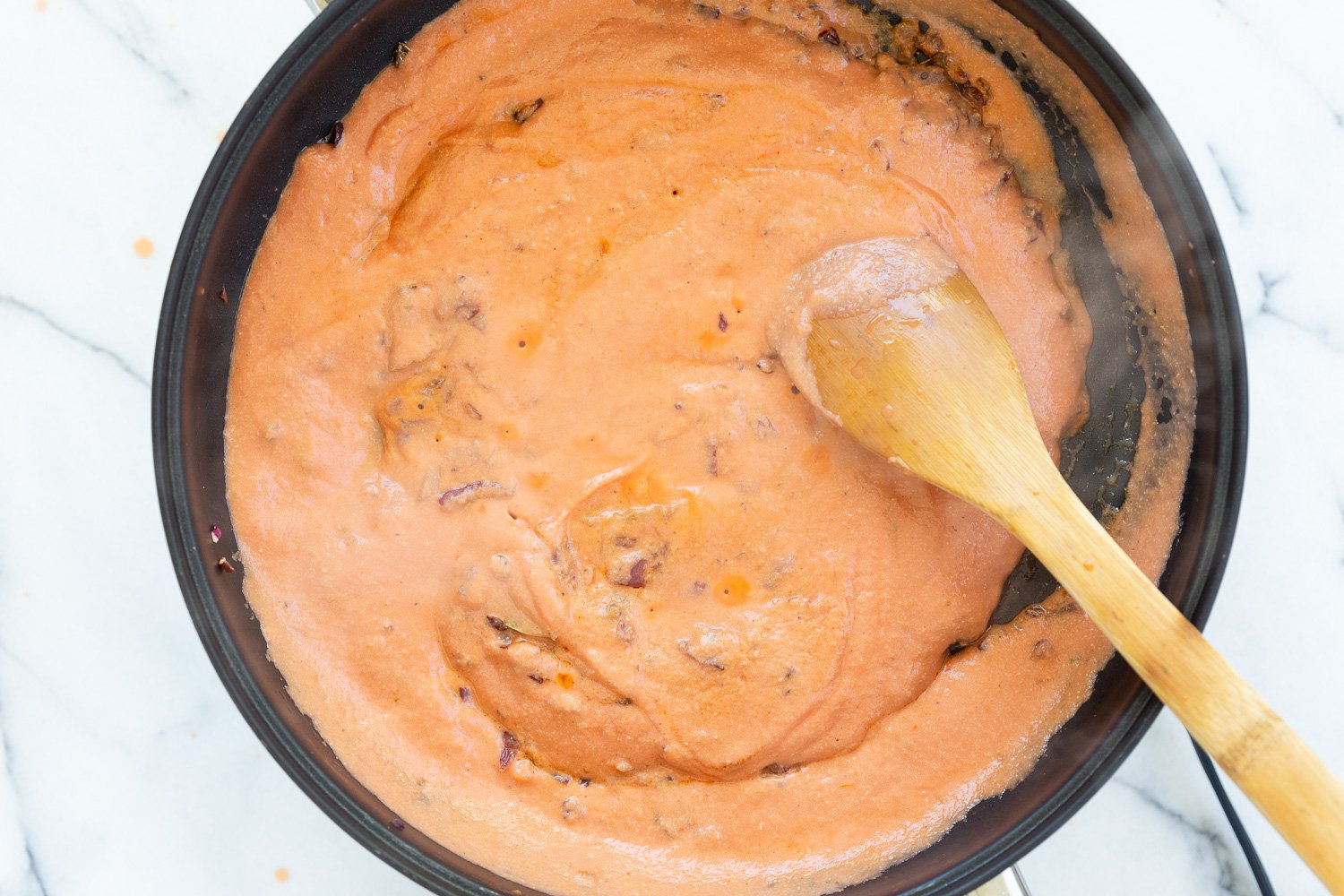 Vegan Paneer Lababdar sauce in a black skillet