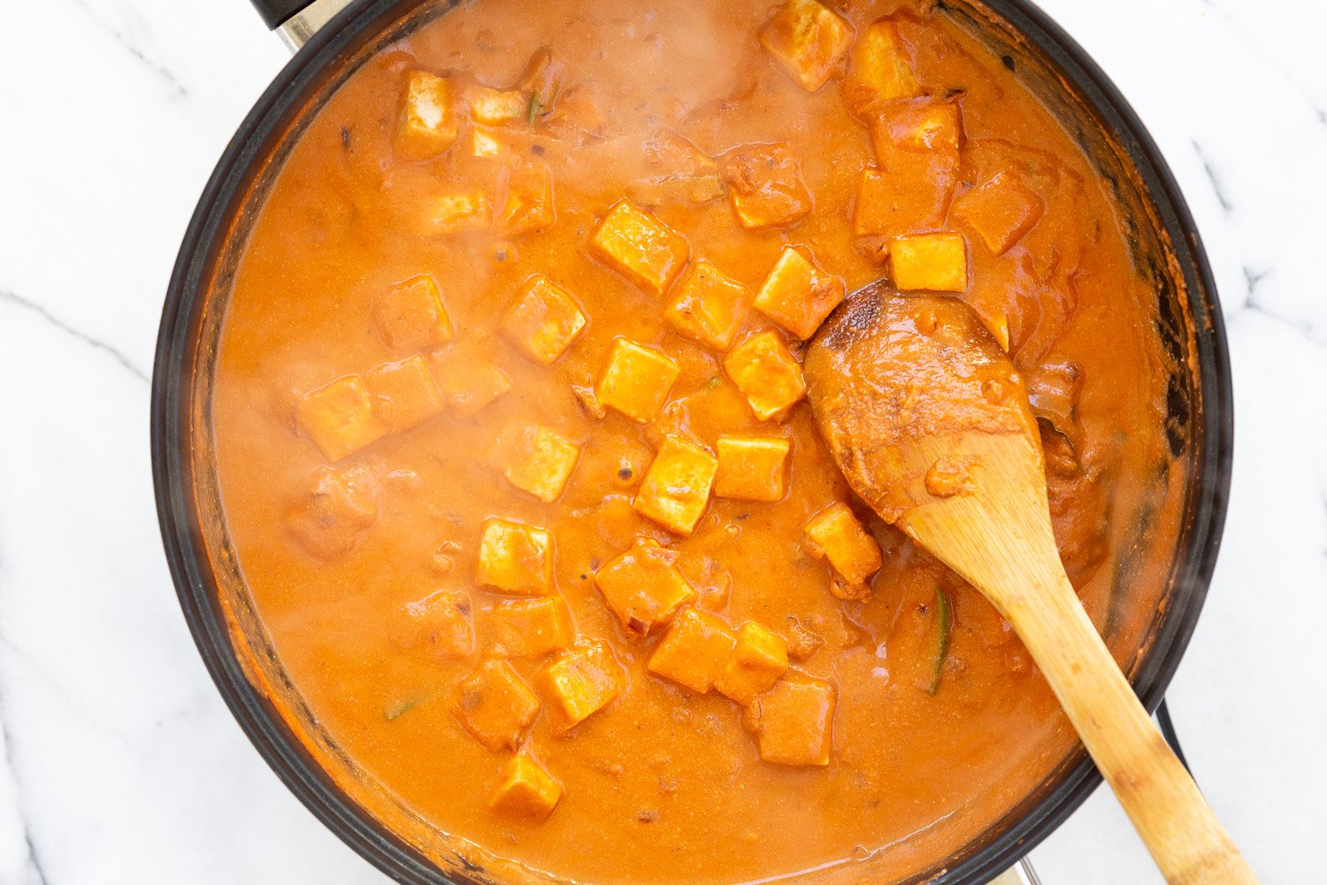 Vegan Paneer Lababdar sauce in a black skillet