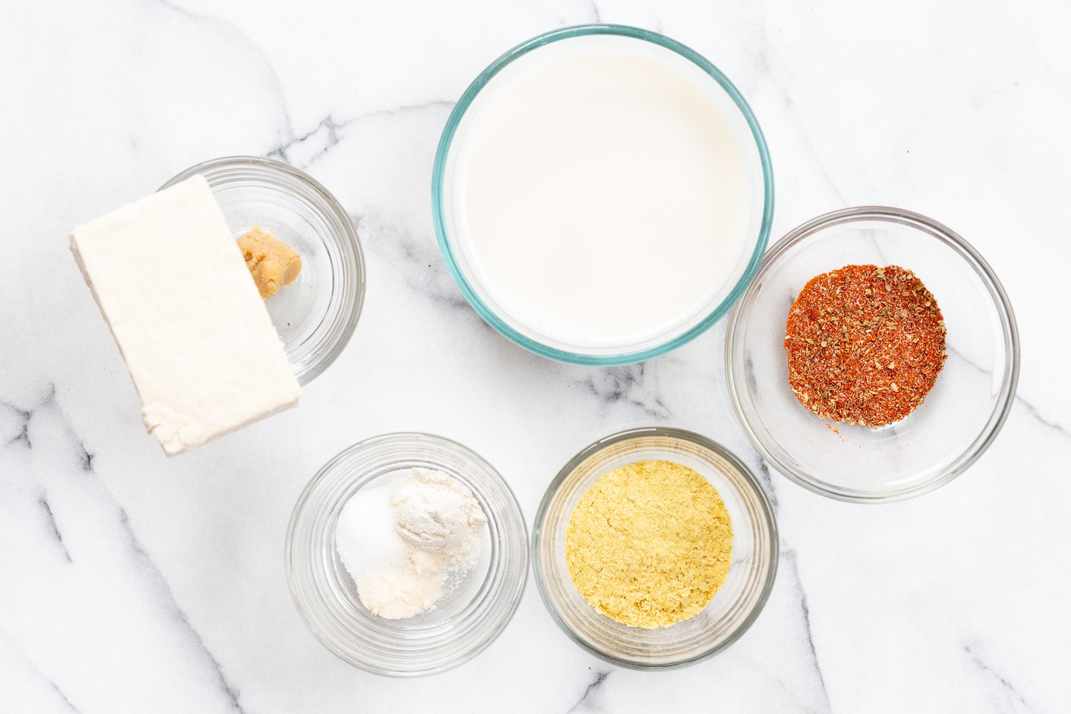Ingredients for our Vegan Cream Cajun Pasta Sauce in Bowls