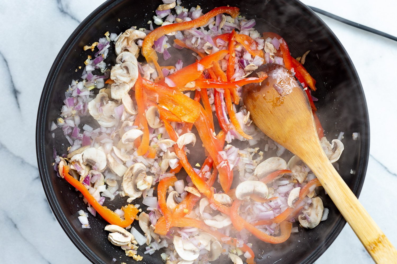 Onion and pepper for our creamy cajun pasta sauce