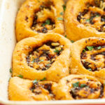 Vegan Pizza Rolls. Easy Pizza dough stuffed with herbed mushroom tomato filling, rolled, sliced and baked. Delicious snack or appetizer! #Vegan #Soyfree #Nutfree #Recipe #Veganpizzarolls #VeganRicha 