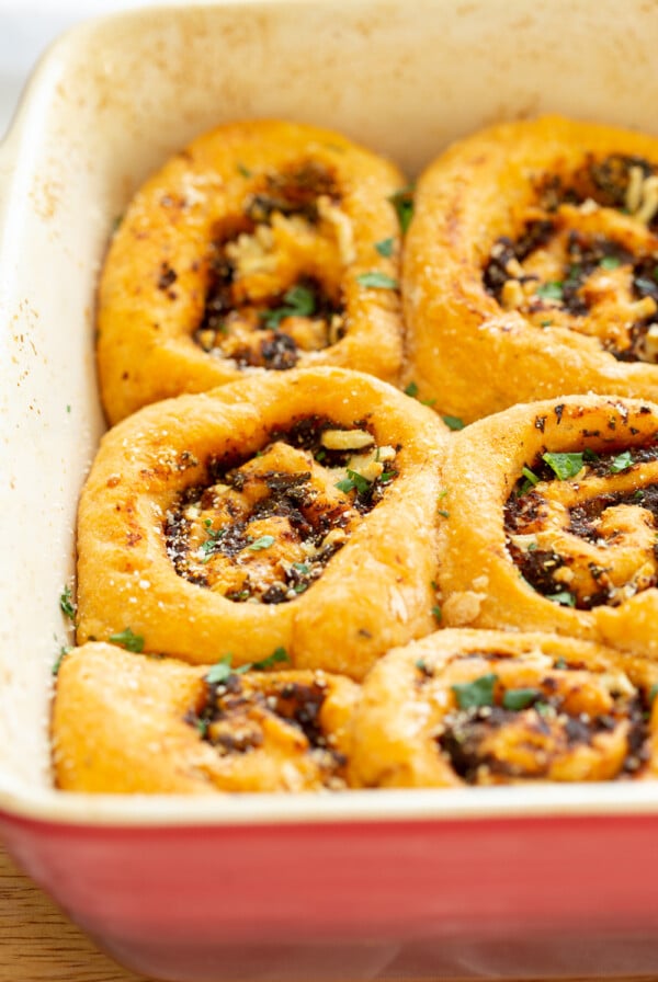 Vegan Pizza Rolls. Easy Pizza dough stuffed with herbed mushroom tomato filling, rolled, sliced and baked. Delicious snack or appetizer! #Vegan #Soyfree #Nutfree #Recipe #Veganpizzarolls #VeganRicha 