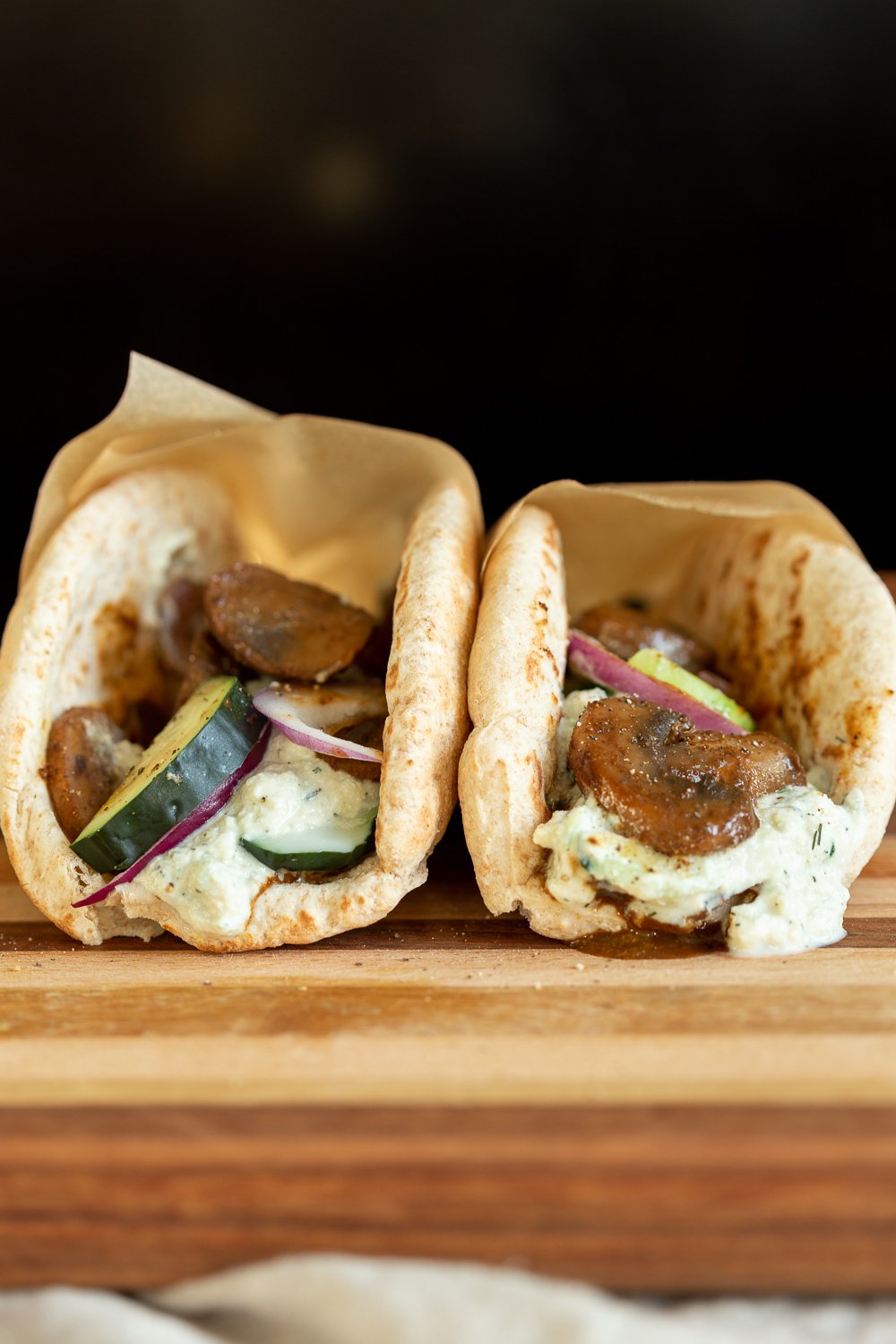 Vegan Gyros with mushrooms on wood board