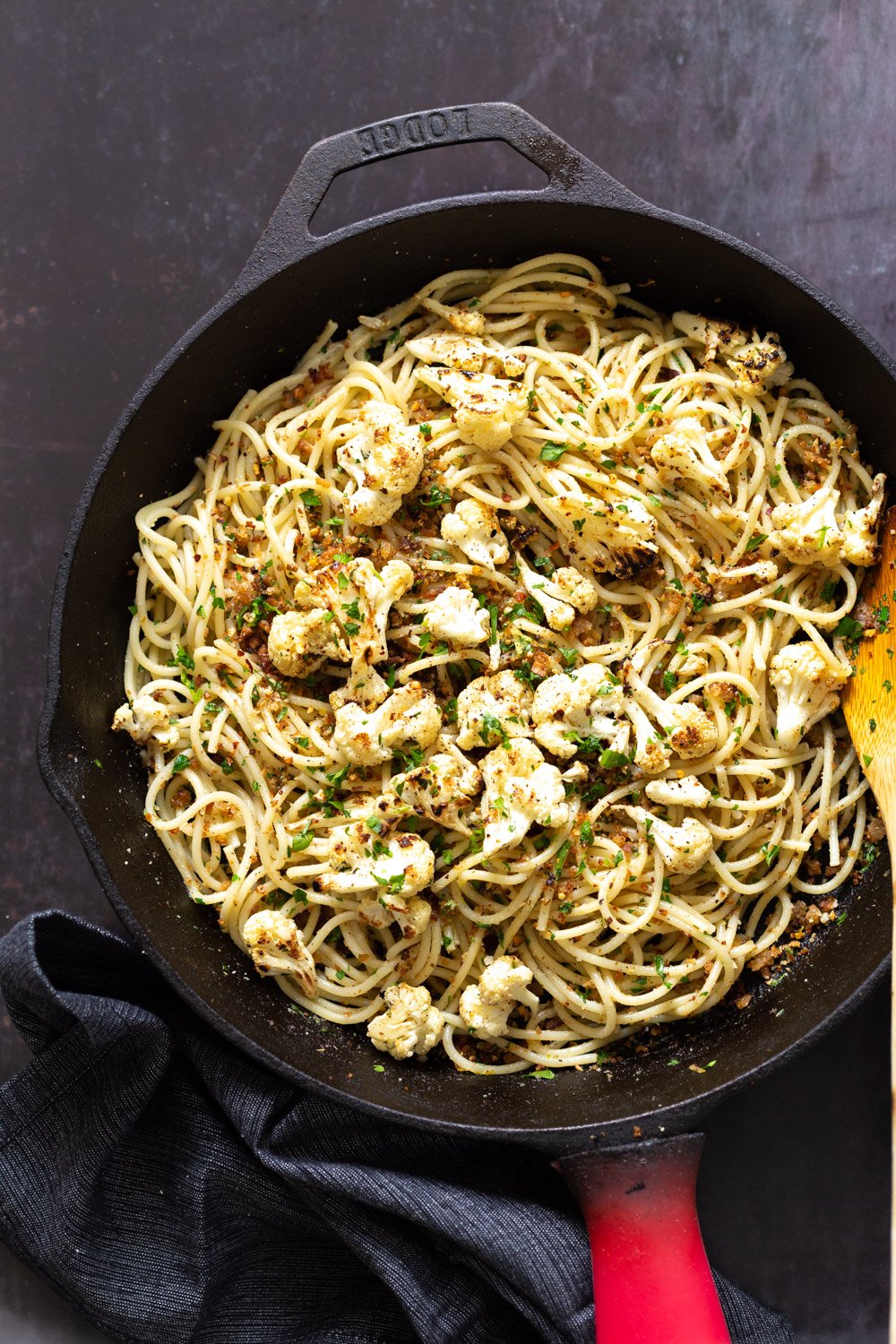 Spaghetti with toasted garlic breadcrumbs in a cast iron skillet