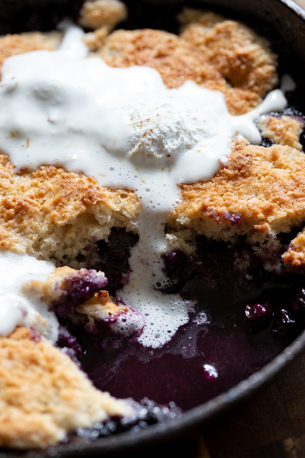 Our Vegan Blueberry Cobbler in a Cast Iron skillet