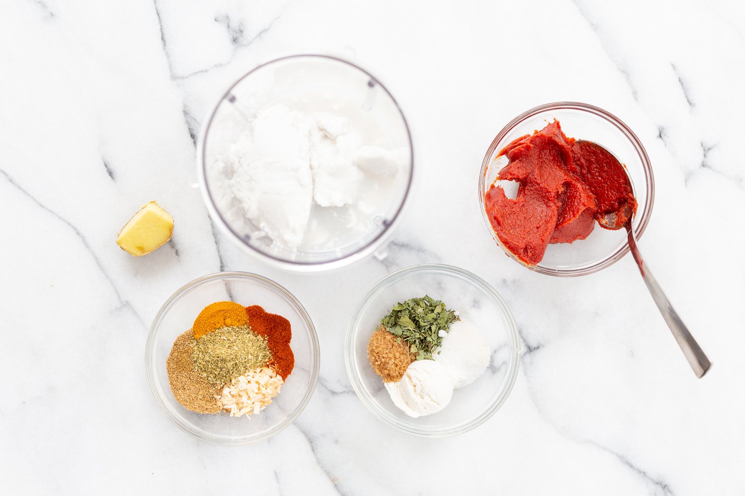 Ingredients in bowls for the creamy sauce for our Vegan Cauliflower Pea Curry