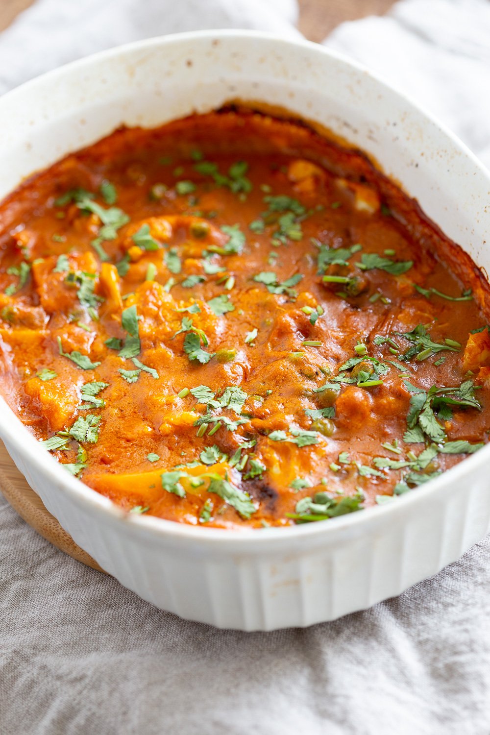 Vegan Cauliflower Pea Curry - 1 Pot Gobi Matar masala. This cauliflower peas curry gets baked in the oven. Creamy roasted flavors without standing around roasting the sauce. #Vegan #Glutenfree #Nutfree #Soyfree #Recipe #VeganRicha #gobimatar #cauliflowerpeacurry . Add some cooked chickpeas to make a meal