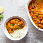 Vegan Cauliflower Pea Curry - 1 Pot Gobi Matar masala. This cauliflower peas curry gets baked in the oven. Creamy roasted flavors without standing around roasting the sauce. #Vegan #Glutenfree #Nutfree #Soyfree #Recipe #VeganRicha #gobimatar #cauliflowerpeacurry . Add some cooked chickpeas to make a meal