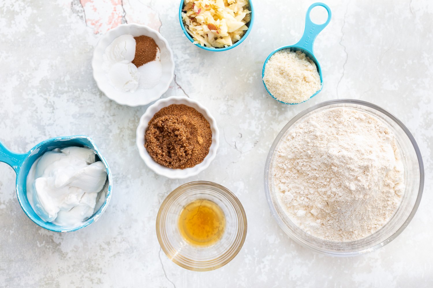 Ingredients for our Vegan Churro Scones in bowls and measuring cups