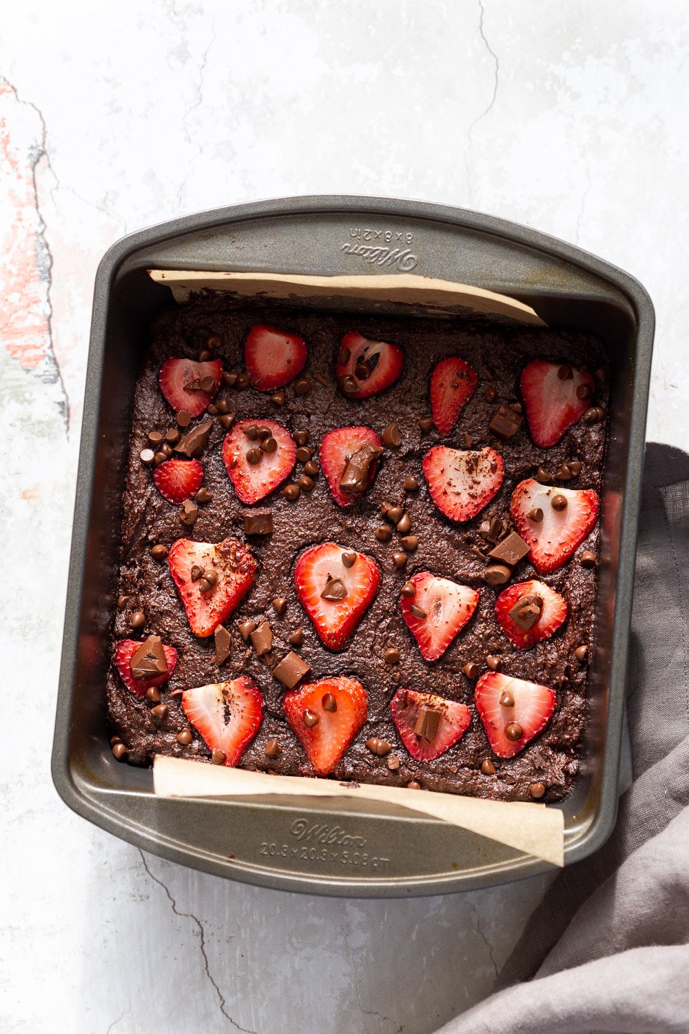 Our Vegan Glutenfree Grainfree Strawberry Brownies in a grey brownie pan
