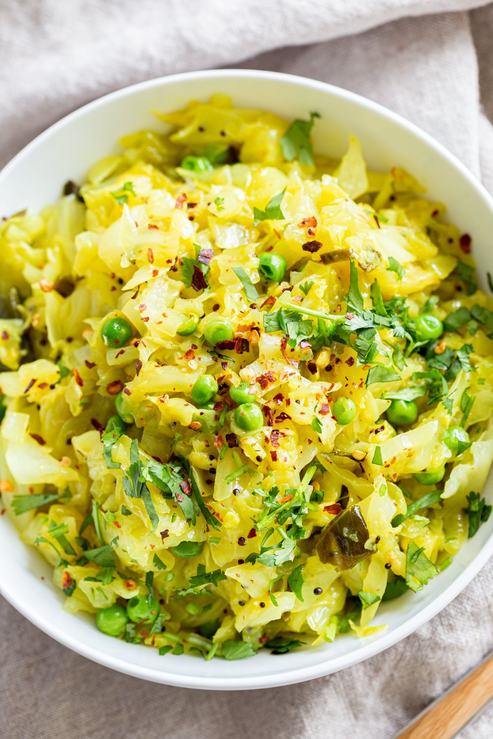 Instant Pot Indian Cabbage and Peas in a white bowl