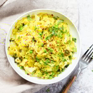 Instant Pot Indian Cabbage and Peas in a white bowl