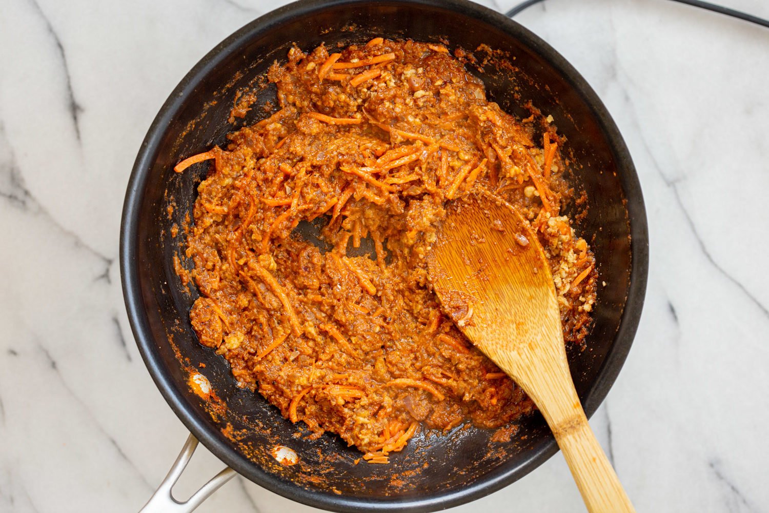 Sauce for our Vegan Keema Madras on a black skillet
