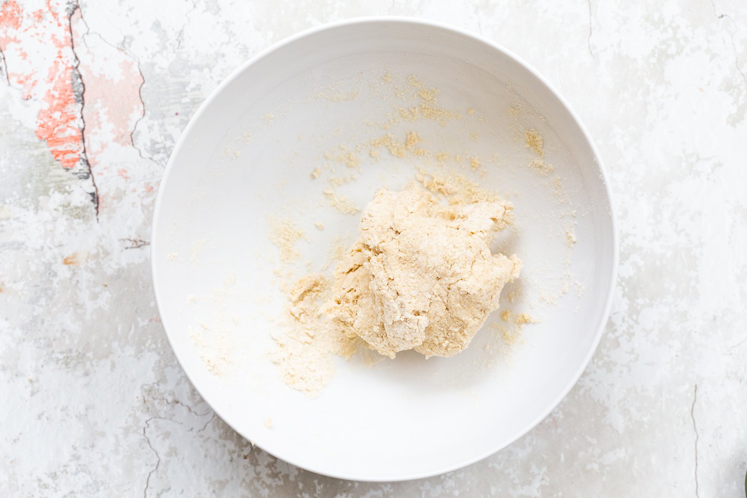 Ingredients for the crust of our Vegan Strawberry Galette in white bowl