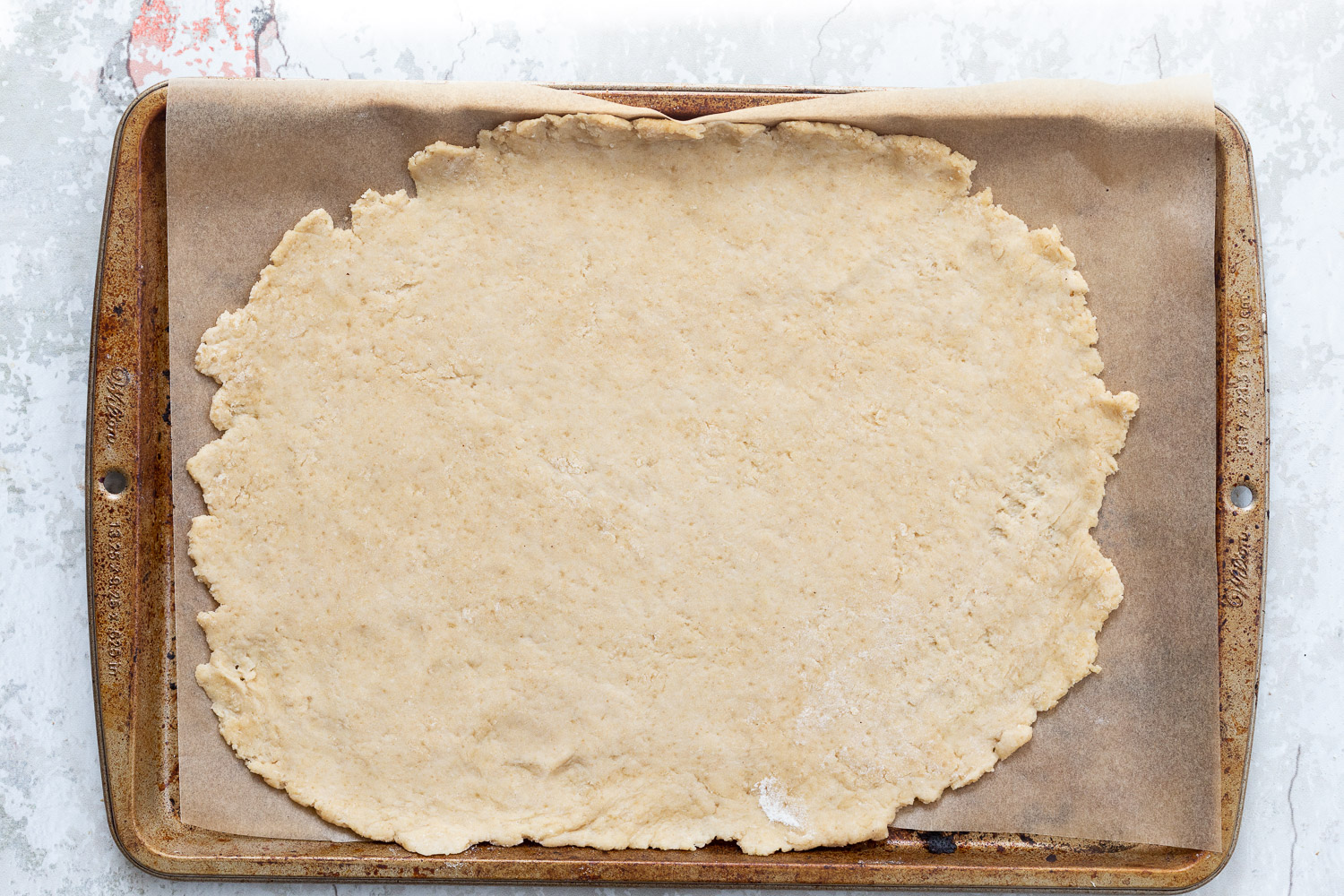 Dough for our Vegan Strawberry Galette on parchment
