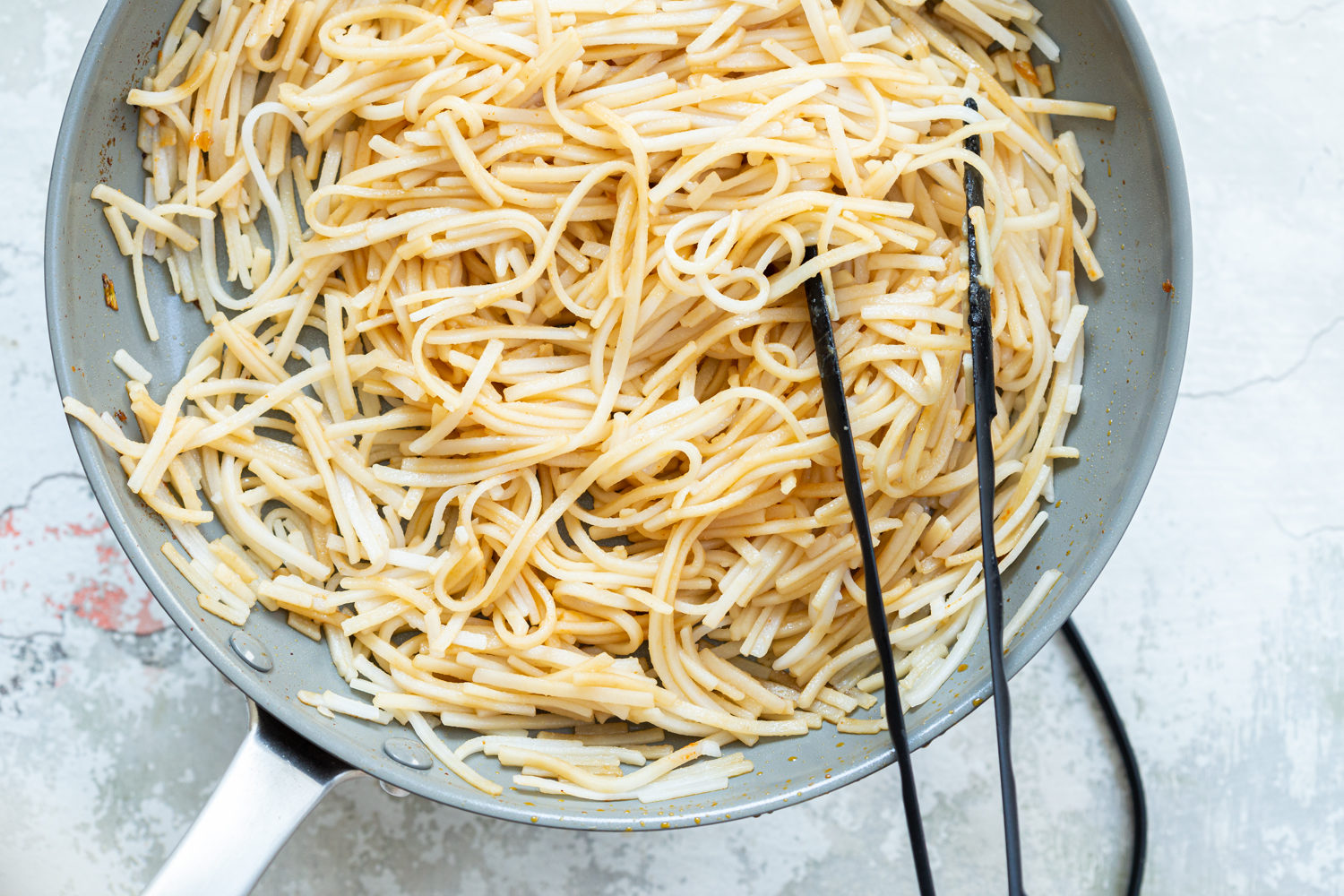 Our sesame noodles in grey skillet
