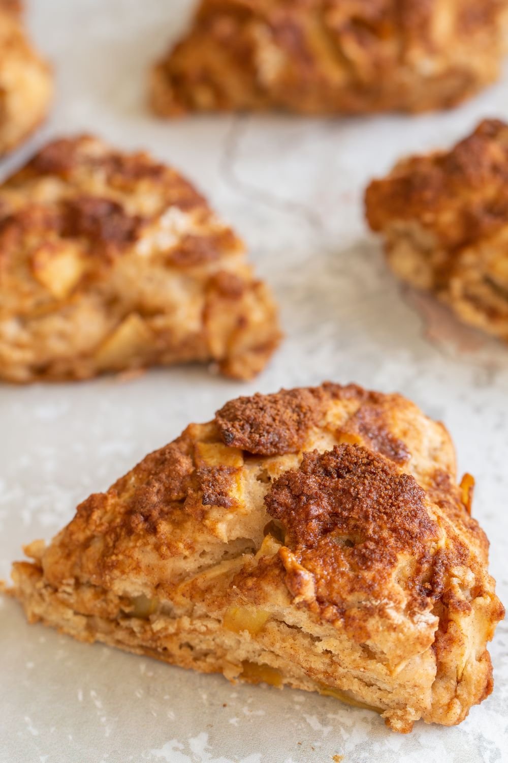 Vegan Apple Cinnamon Scones on white tile