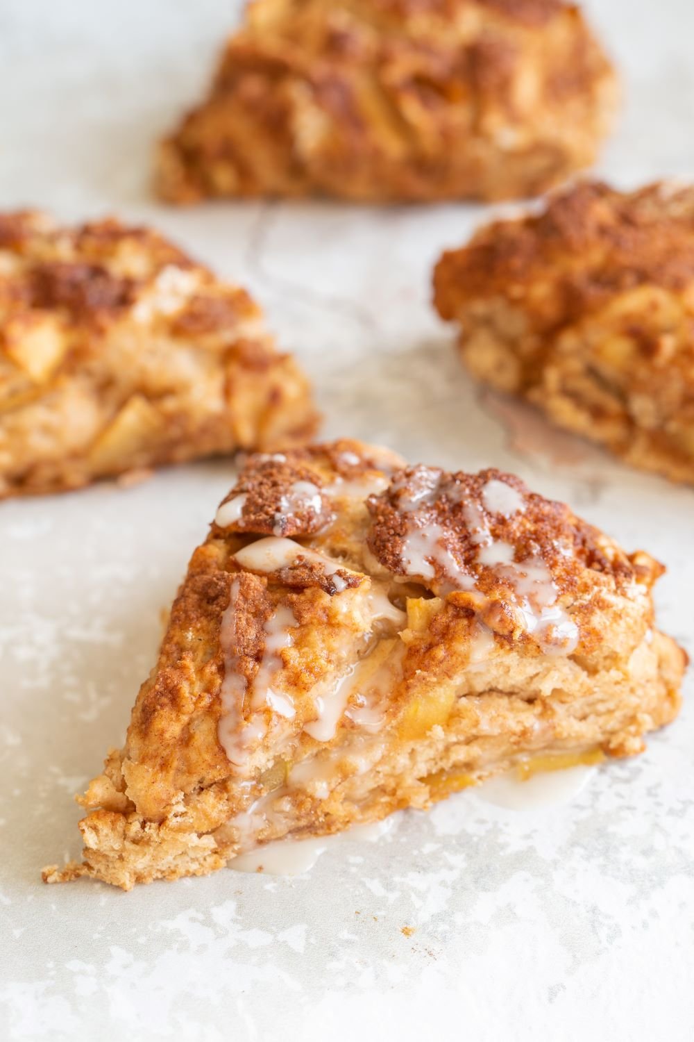 Vegan Apple Cinnamon Scones on white tile